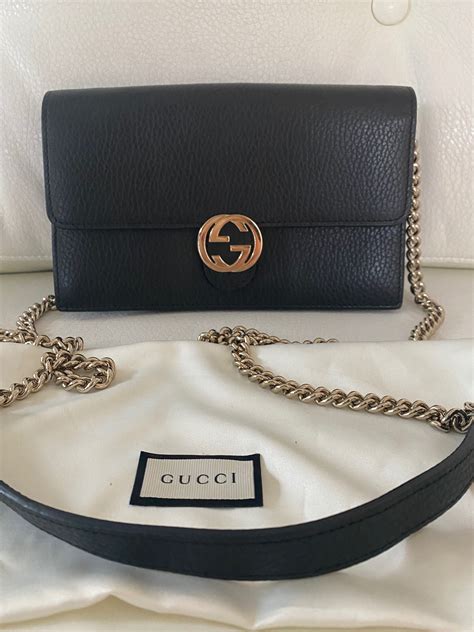 gucci chain coin purse|Gucci interlocking wallet on chain.